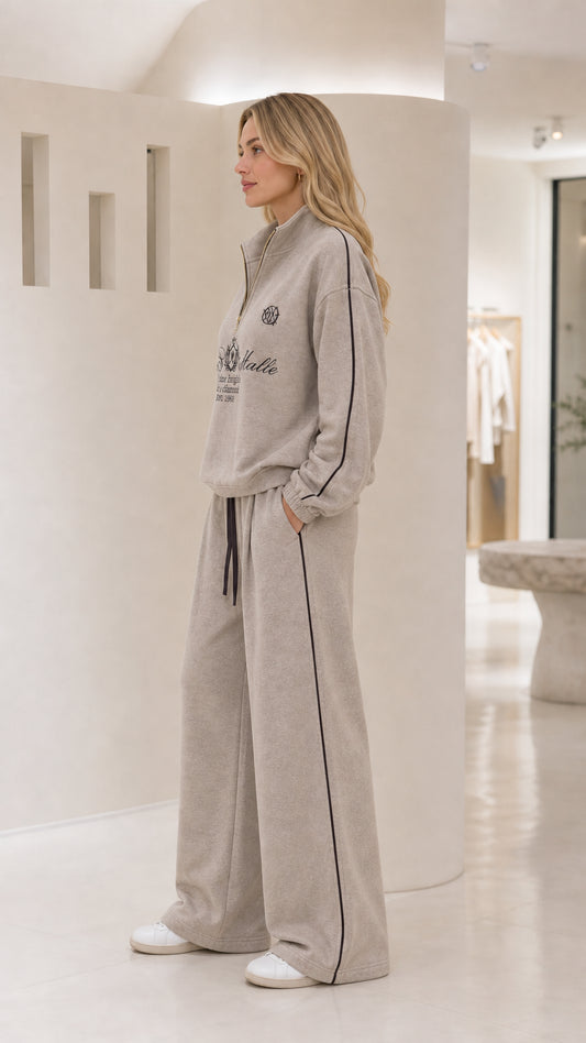 Side view of the taupe women's quarter-zip tracksuit set