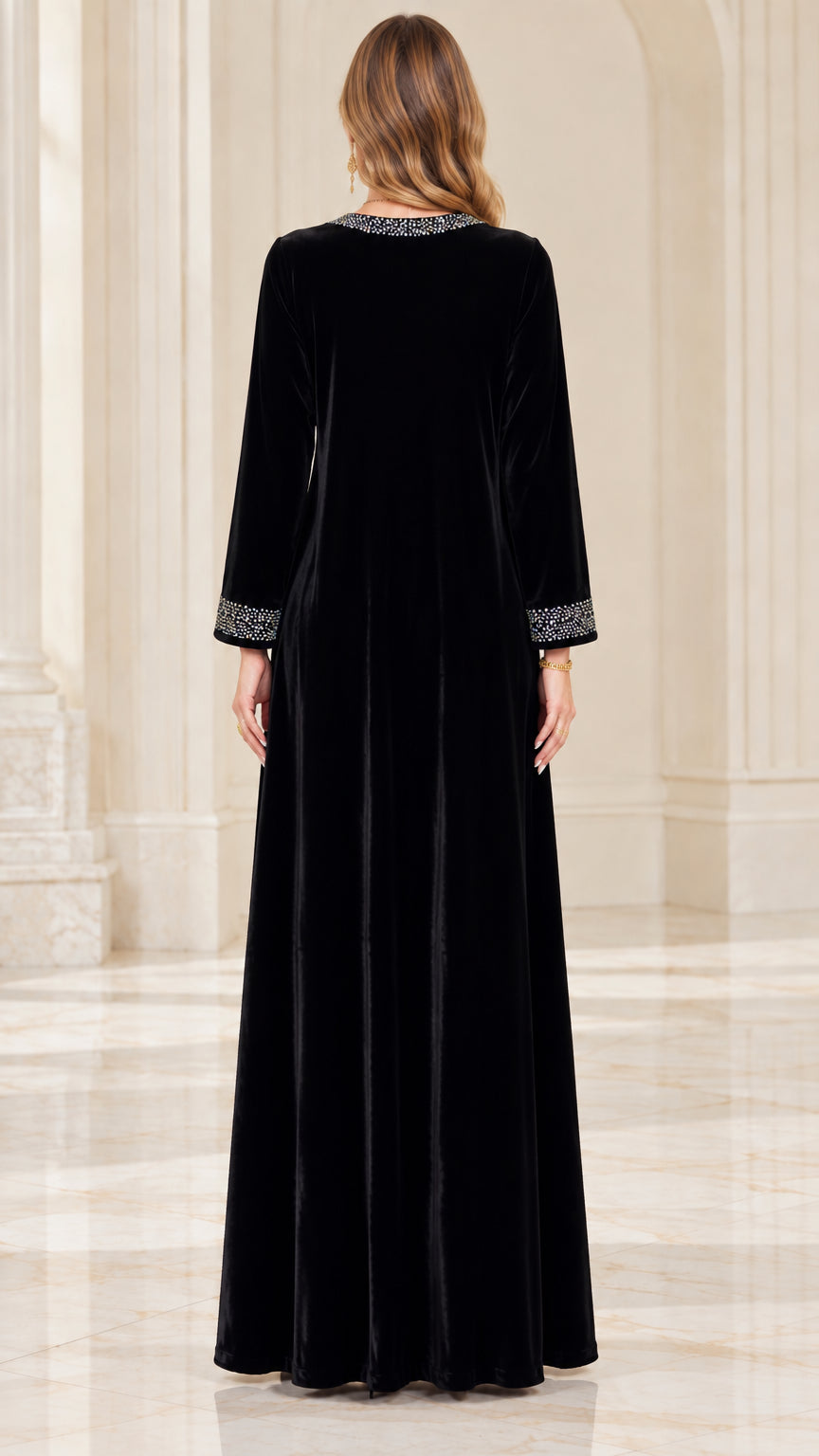 Back view of black velvet long sleeve floor-length gown