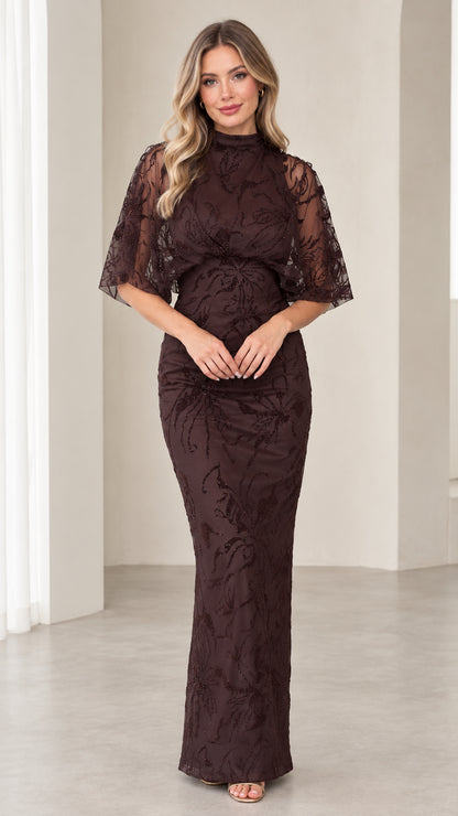 Front view of model wearing Chocolate Brown high neck beaded maxi dress with flutter sleeves