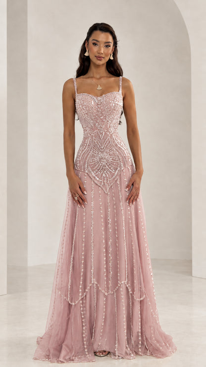 Front view of woman wearing Blush Pink beaded sweetheart tulle formal maxi dress