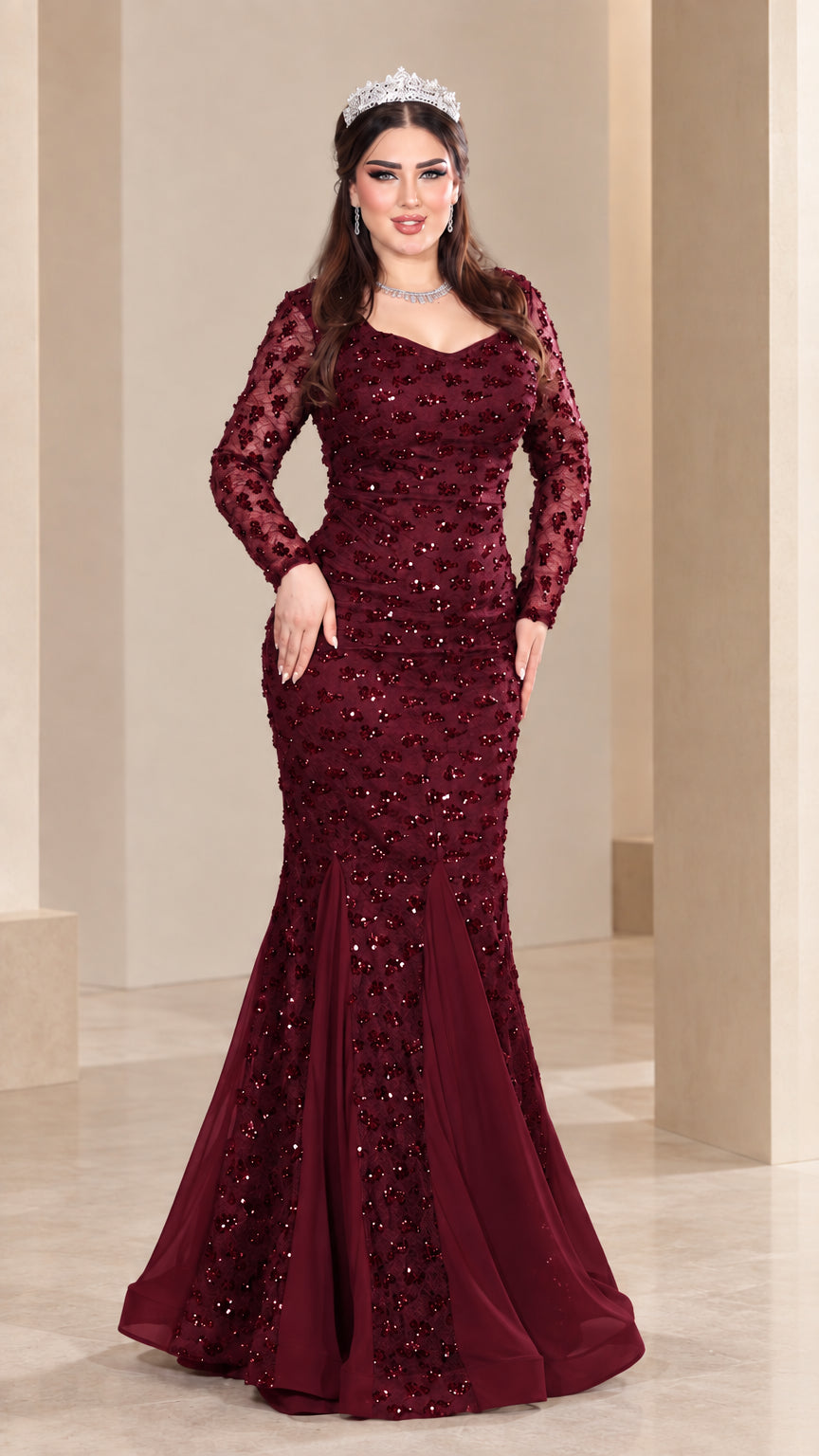 Front view of model wearing burgundy wine red sequin mermaid evening gown