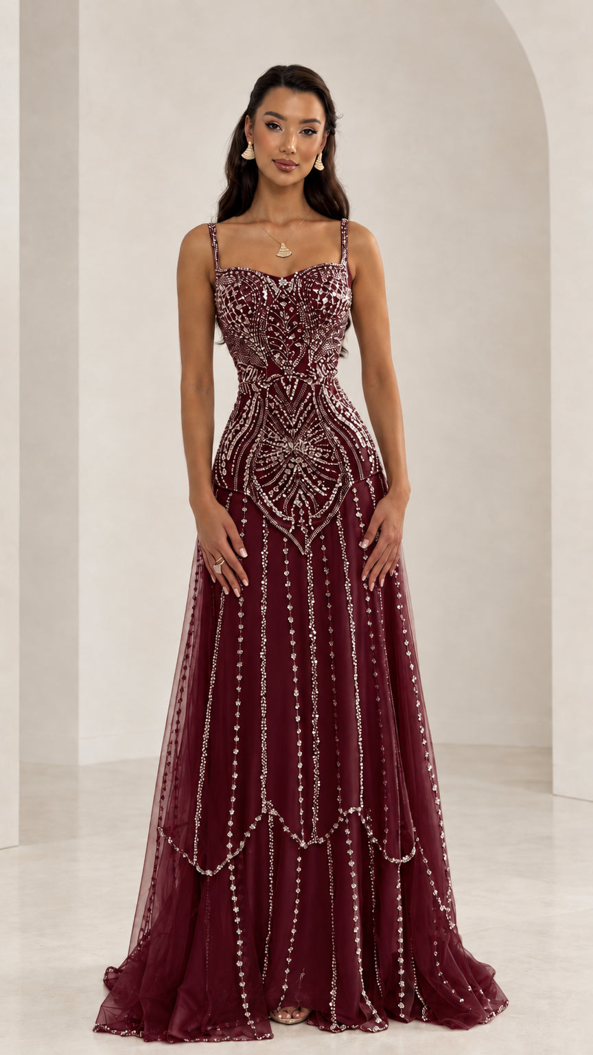 Front view of woman wearing Burgundy wine red beaded sweetheart tulle evening dress