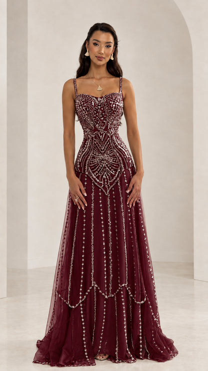 Front view of woman wearing Burgundy wine red beaded sweetheart tulle evening dress