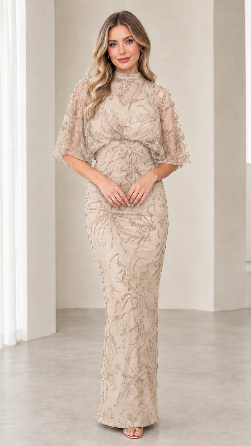 Model wearing Champagne beaded evening dress with sheer flutter sleeves